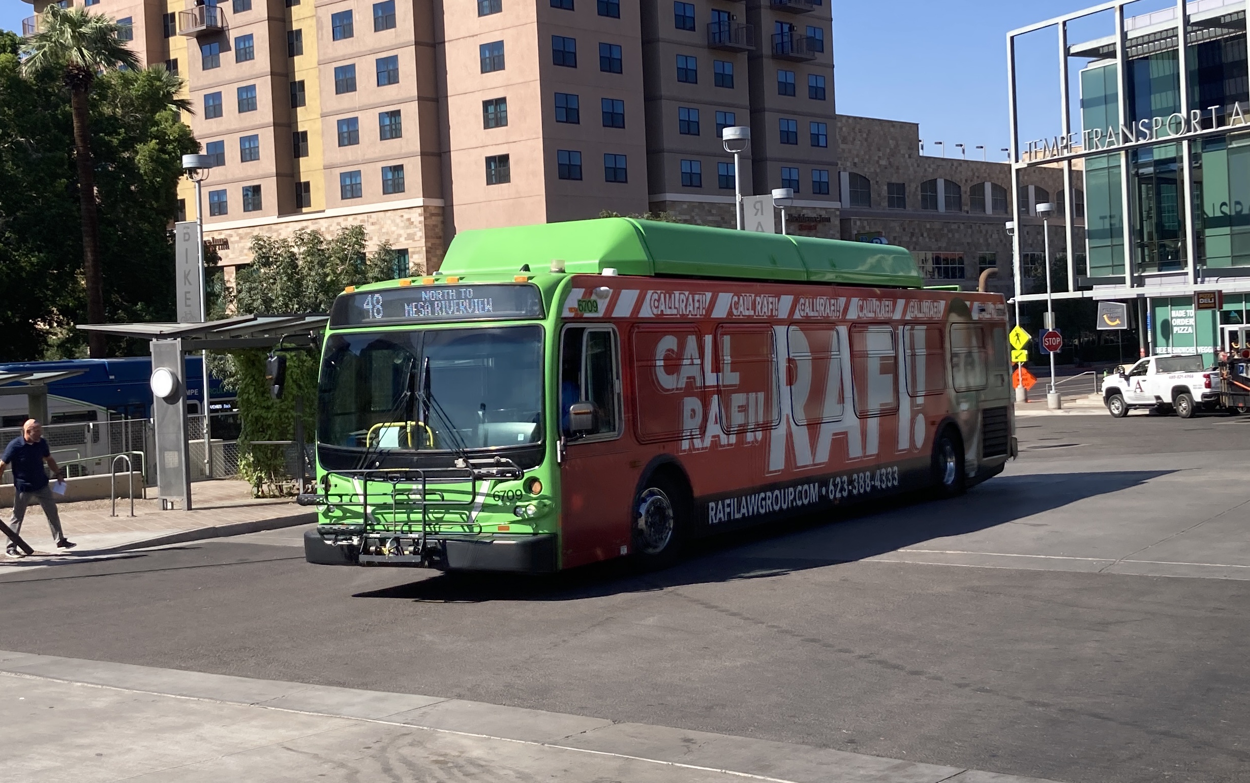 A green Valley Metro bus, number 6709, at the Tempe Transportation Center, traveling route 48 to Mesa Riverview