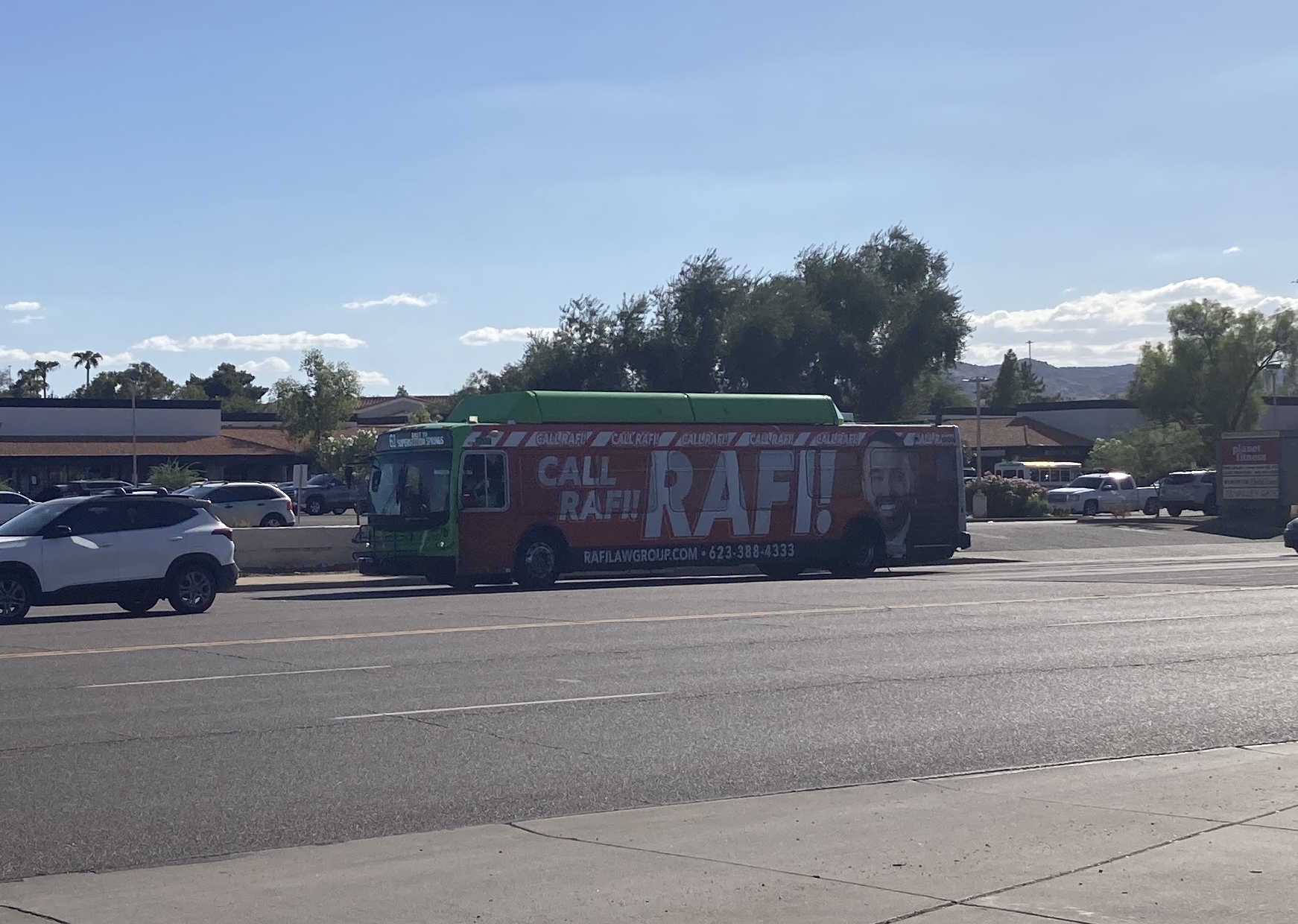 A green Valley Metro bus, number 6709, traveling eastbound on Southern Avenue in Tempe on route 61 to Superstition Springs Transit Center