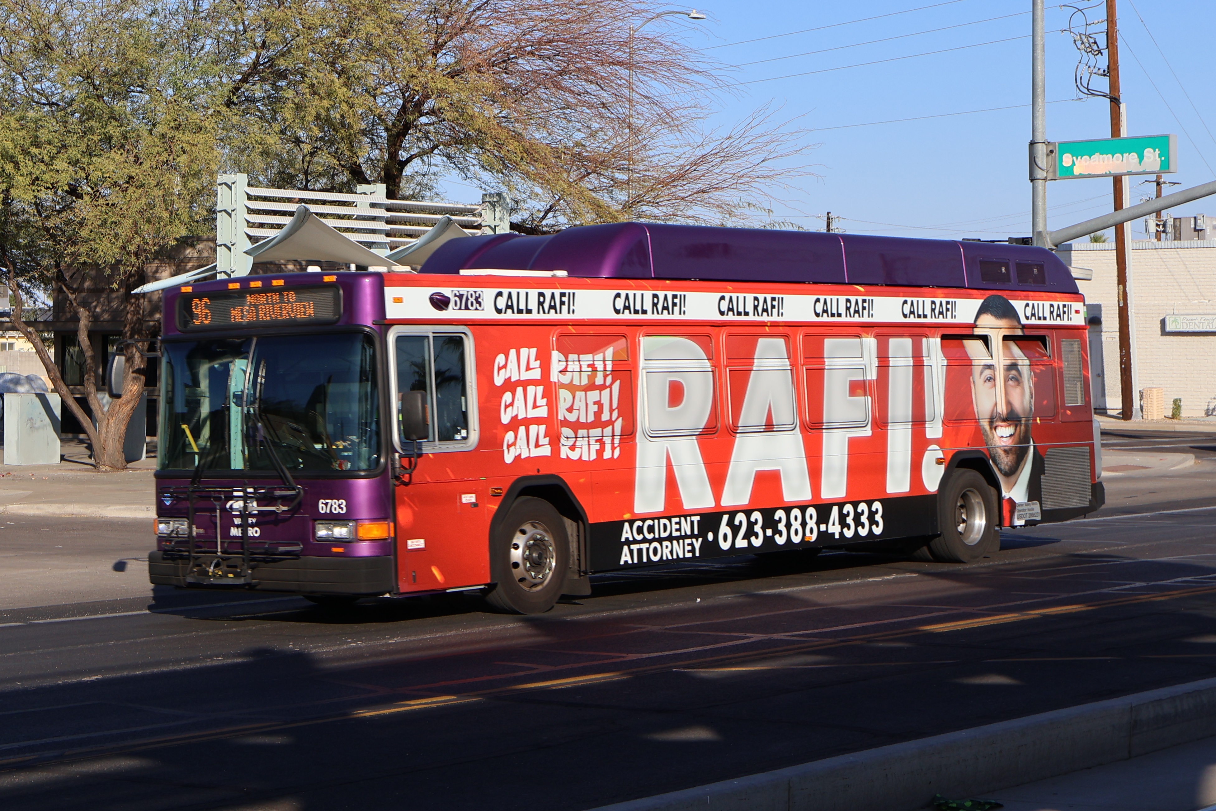 A gray and purple Valley Metro bus with a white and green stripe, number 6783, traveling westbound on Main Street in Mesa on route 96 to Mesa Riverview