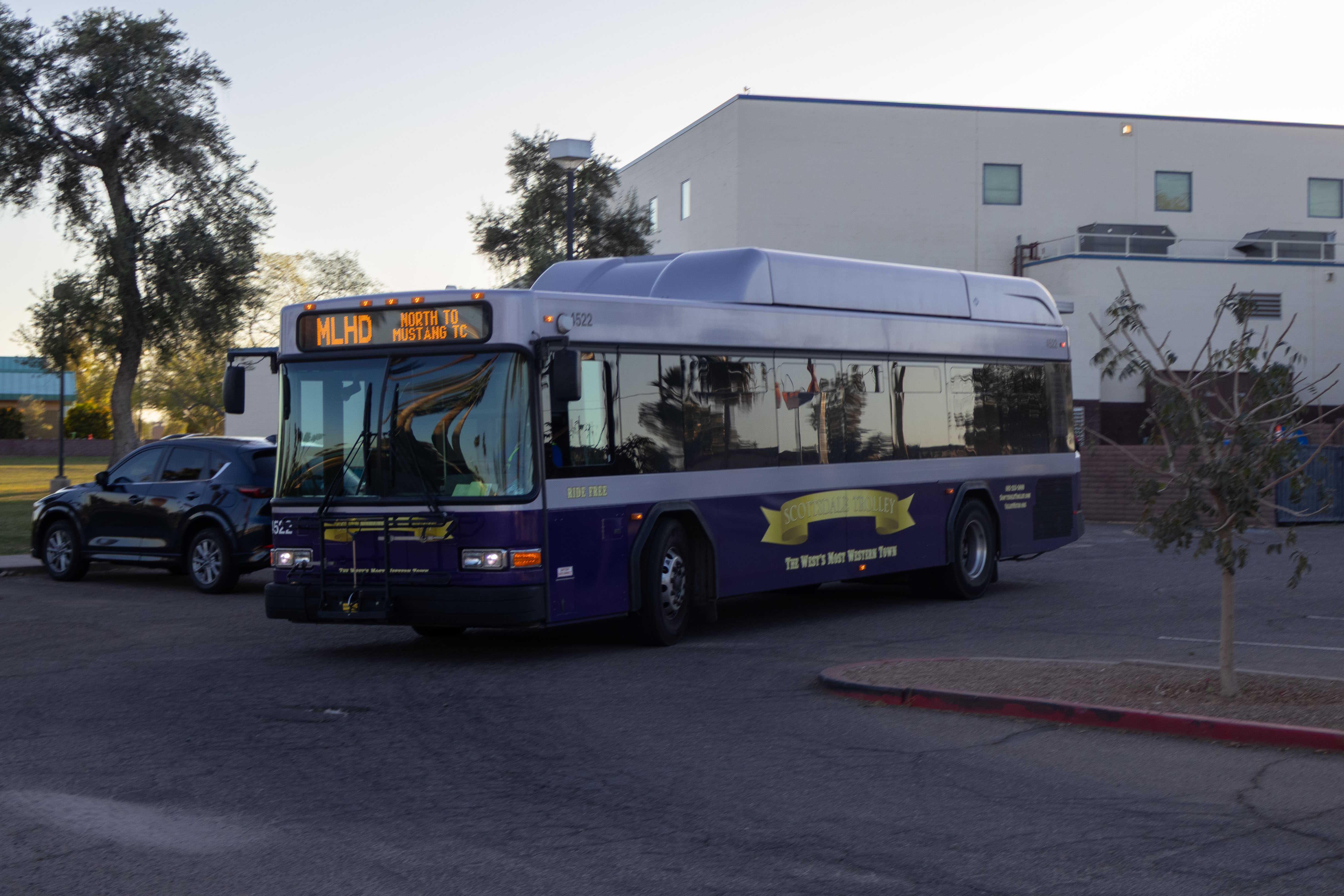 A purple and silver Scottsdale Trolley bus, number 4522, at El Dorado Park on the Miller/Hayden Trolley route to Mustang Transit Center