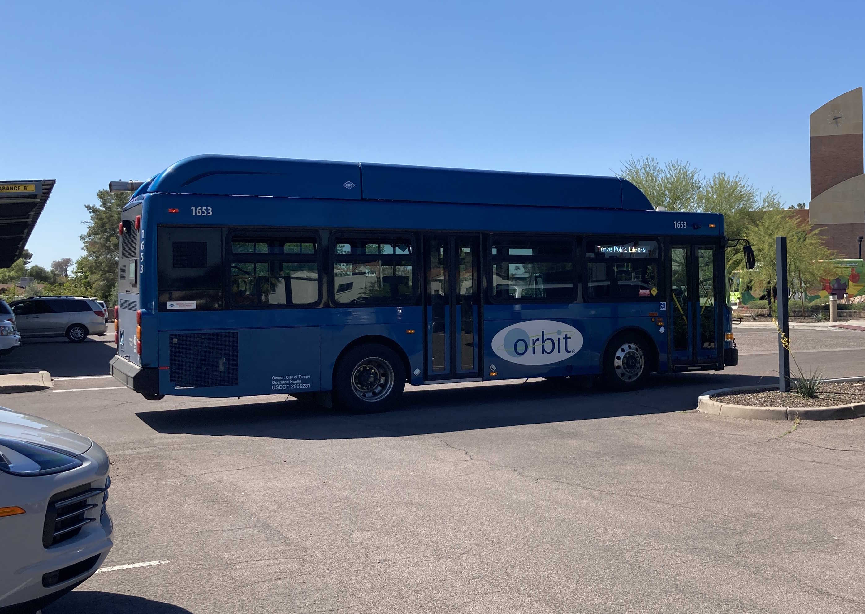 A blue Orbit bus, number 1653, at the Tempe Public Library on the Saturn route to Tempe Public Library