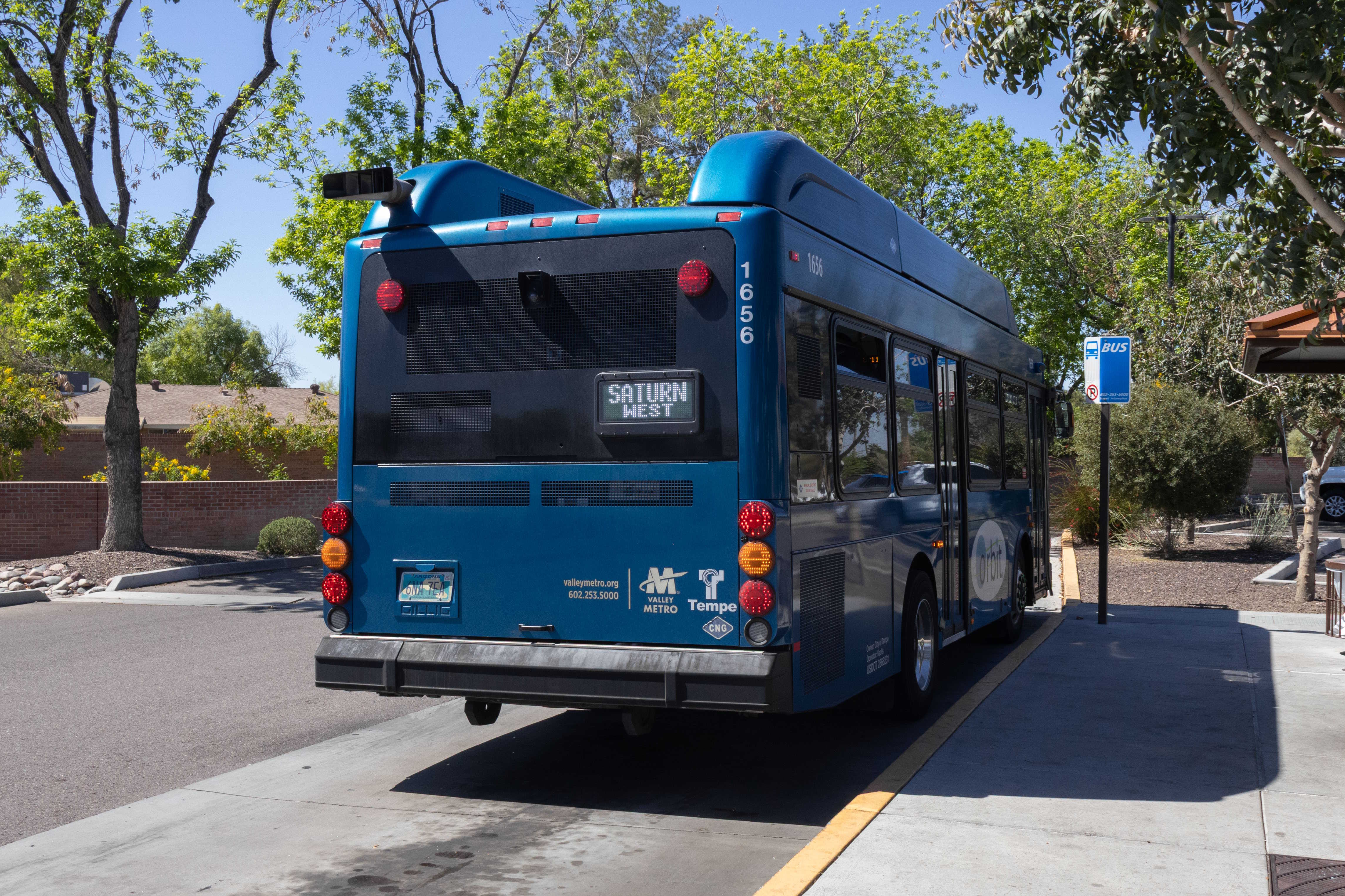 A blue Orbit bus, number 1656, at the Tempe Public Library on the Saturn route to Priest Drive and Elliot Road